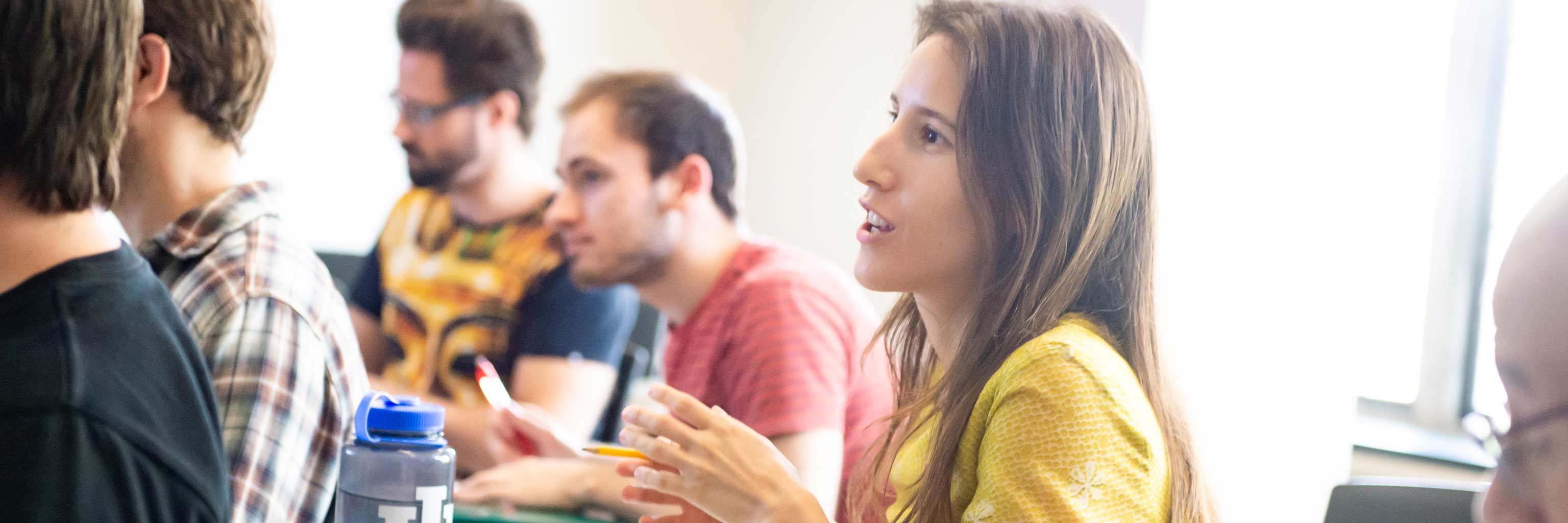 A students answers a question during class.