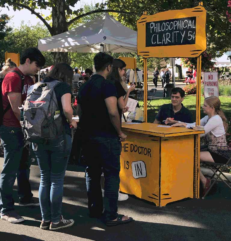 booth at first Thursdays with students in line